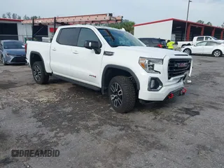 2022 GMC Sierra 1500 AT4 with VIN 3GTP9EEL8NG192369, listed as a IAAI auction lot 42400764 with 99,261 mi miles and . Bid and sale history available at DreamBid. Image 1.