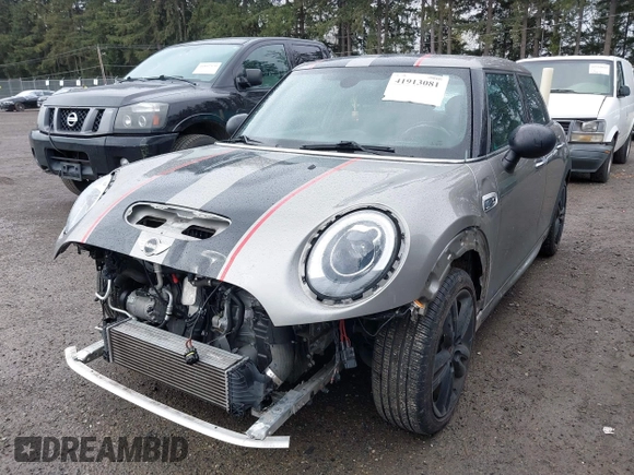 2017 MINI Hardtop 4 Door Cooper S z VIN WMWXU3C58H2D33073, wystawiony jako IAAI lot #41913081 z przebiegiem 51 631 mil mil oraz . Historia ofert i sprzedaży dostępna na DreamBid. Obrazek 2.