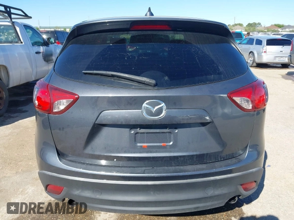 2016 Mazda CX-5 Grand Touring with VIN JM3KE2DYXG0784615, listed as a IAAI auction lot 41846853 with 72,185 mi miles. Bid and sale history available at carsss.com. Image 16.