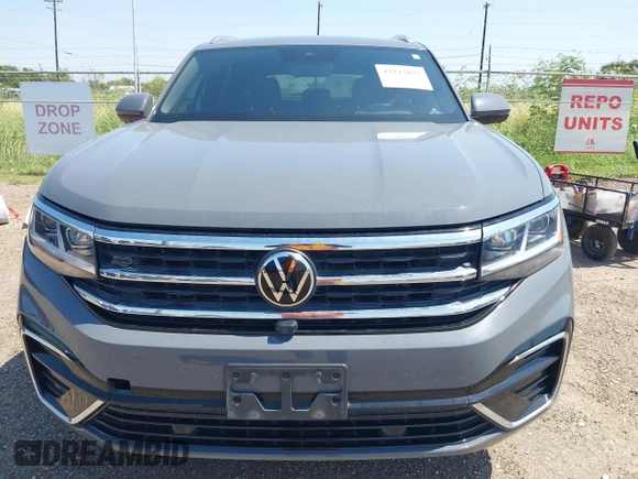 2023 Volkswagen Atlas SEL Premium R-Line z VIN 1V2FE2CA1PC218595, wystawiony jako IAAI lot #42223877 z przebiegiem 48 477 mil mil oraz . Historia ofert i sprzedaży dostępna na DreamBid. Obrazek 6.