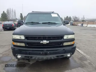 2002 Chevrolet Suburban Z71 with VIN 3GNFK16T12G354322, listed as a IAAI auction lot 41646865 with 229,700 mi miles. Bid and sale history available at carsss.com. Image 12.