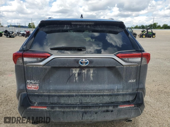2022 Toyota RAV4 XSE with VIN JTMEB3FV4ND076096, listed as a Copart auction lot 58802695 with 141,543 mi miles and Salvage title. Bid and sale history available at DreamBid. Image 6.