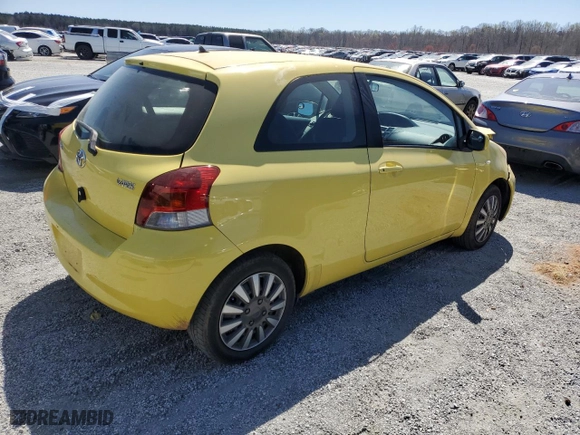 2009 Toyota Yaris with VIN JTDJT903195276164, listed as a Copart auction lot 50129115 with 165,824 mi miles and Salvage Title. Bid and sale history available at carsss.com. Image 3.