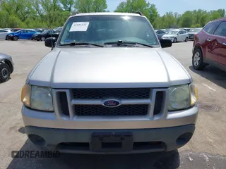 2005 Ford Explorer Sport Trac XLS z VIN 1FMZU77K75UB52008, wystawiony jako IAAI lot #42103222 z przebiegiem 196 605 mil mil oraz . Historia ofert i sprzedaży dostępna na DreamBid. Obrazek 6.