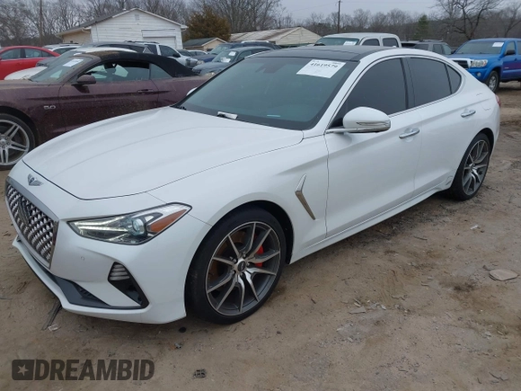 2020 Genesis G70 3.3T with VIN KMTG34LEXLU060919, listed as a IAAI auction lot 41619579 with 69,859 mi miles. Bid and sale history available at carsss.com. Image 2.