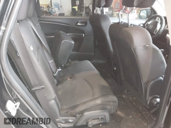 2013 Dodge Journey SXT with VIN 3C4PDDBG0DT660956, listed as a IAAI auction lot 41593385 with 196,021 mi miles and . Bid and sale history available at DreamBid. Image 8.