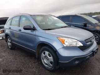 2007 Honda CR-V LX with VIN JHLRE38327C074895, listed as a IAAI auction lot 41519425 with 219,332 mi miles. Bid and sale history available at carsss.com. Image 13.