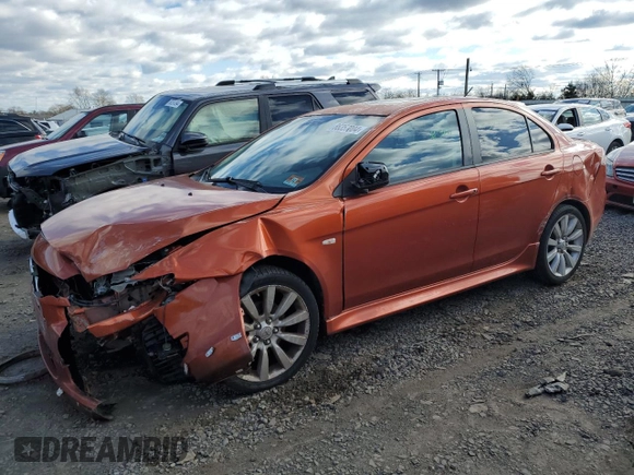 2011 Mitsubishi Lancer GTS with VIN JA32U8FW6BU011215, listed as a Copart auction lot 86357004 with 128,577 mi miles and Salvage Title. Bid and sale history available at carsss.com. Image 1.