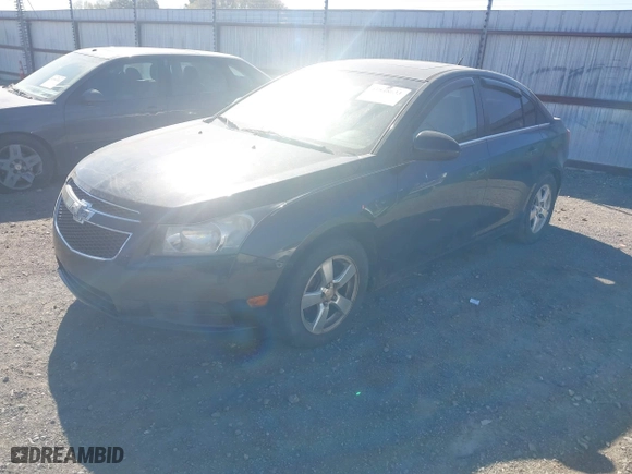 2011 Chevrolet Cruze LT w/2LT with VIN 1G1PG5S90B7128292, listed as a IAAI auction lot 41848633 with 182,963 mi miles. Bid and sale history available at carsss.com. Image 2.