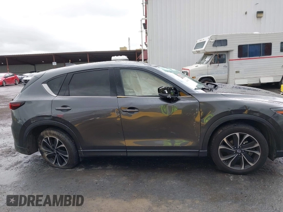 2023 Mazda CX-5 2.5 S Premium Package with VIN JM3KFBDM4P0174901, listed as a IAAI auction lot 41940271 with 25,805 mi miles. Bid and sale history available at carsss.com. Image 13.