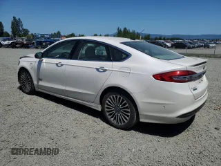 2017 Ford Fusion Titanium with VIN 3FA6P0SU6HR414181, listed as a Copart auction lot 59240095 with 57,224 mi miles and Salvage title. Bid and sale history available at DreamBid. Image 2.