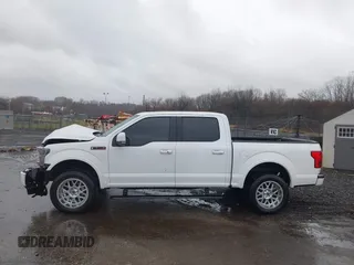 2019 Ford F-150 XL with VIN 1FTEW1E58KFC00154, listed as a IAAI auction lot 41051975 with 57,746 mi miles and . Bid and sale history available at DreamBid. Image 14.