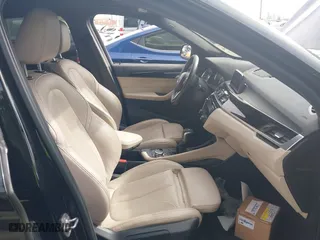 2018 BMW X1 sDrive28i with VIN WBXHU7C39J5L07129, listed as a IAAI auction lot 41472014 with 56,486 mi miles. Bid and sale history available at carsss.com. Image 5.
