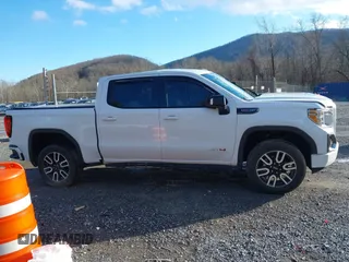 2021 GMC Sierra 1500 AT4 with VIN 3GTP9EEL1MG405564, listed as a IAAI auction lot 41214073 with 49,114 mi miles. Bid and sale history available at carsss.com. Image 13.