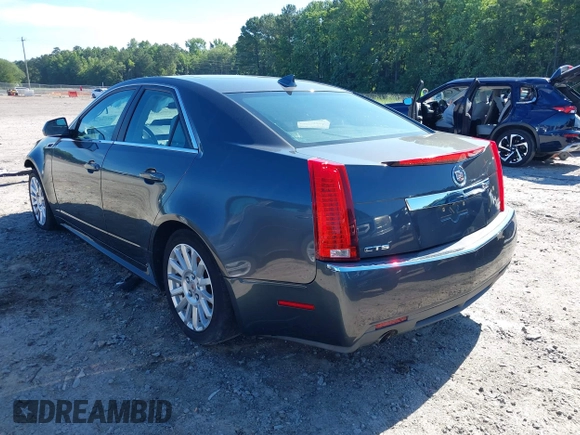 2013 Cadillac CTS Luxury with VIN 1G6DE5E5XD0146158, listed as a IAAI auction lot 42531205 with 130,669 mi miles and . Bid and sale history available at DreamBid. Image 3.