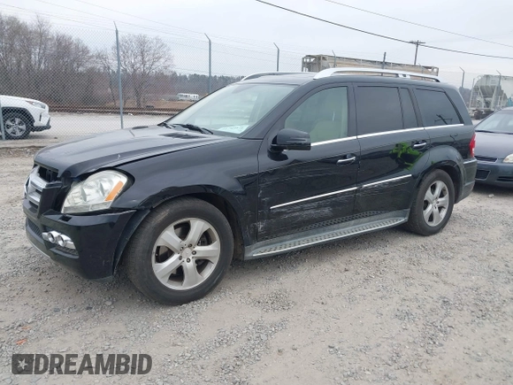 2011 Mercedes-Benz GL-Class GL 450 with VIN 4JGBF7BE9BA649538, listed as a IAAI auction lot 41789876 with 164,423 mi miles. Bid and sale history available at carsss.com. Image 2.