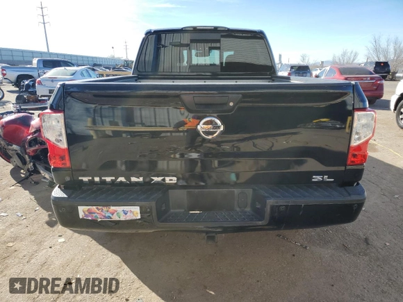 2017 Nissan Titan SL z VIN 1N6BA1F20HN522403, wystawiony jako Copart lot #87477114 z przebiegiem 98 084 mil mil oraz Szkoda całkowita • Salvage title. Historia ofert i sprzedaży dostępna na DreamBid. Obrazek 6.