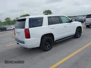 2020 Chevrolet Tahoe Commercial with VIN 1GNSKDEC2LR260646, listed as a IAAI auction lot 42800810 with 114,704 mi miles and . Bid and sale history available at DreamBid. Image 4.