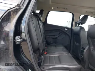 2018 Ford Escape Titanium z VIN 1FMCU9J9XJUB66275, wystawiony jako IAAI lot #42757952 z przebiegiem 97 629 mil mil oraz . Historia ofert i sprzedaży dostępna na DreamBid. Obrazek 8.