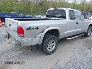 2003 Dodge Dakota Sport with VIN 1D7HG32N13S132871, listed as a IAAI auction lot 42059965 with 125,408 mi miles and . Bid and sale history available at carsss.com. Image 4.