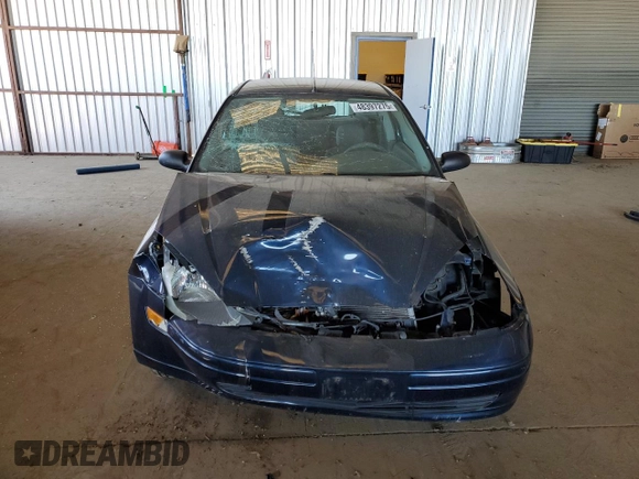 2004 Ford Focus ZX3 with VIN 3FAFP31Z44R127138, listed as a Copart auction lot 48397275 with 129,873 mi miles and Salvage title. Bid and sale history available at DreamBid. Image 5.