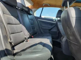 2006 Volkswagen Jetta 1.9L TDI z VIN 3VWDT71K46M043065, wystawiony jako Copart lot #62080885 z przebiegiem 279 917 mil mil oraz Nie do naprawy • Non repairable. Historia ofert i sprzedaży dostępna na DreamBid. Obrazek 10.
