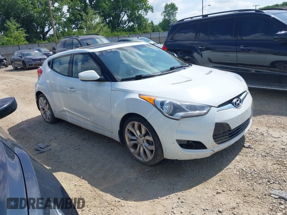 2013 Hyundai Veloster w/Black Int with VIN KMHTC6AD2DU131983, listed as a IAAI auction lot 42671646 with 131,731 mi miles and . Bid and sale history available at DreamBid. Image 1.