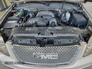 2007 GMC Yukon Denali z VIN 1GKFK63867J362741, wystawiony jako Copart lot #59442875 z przebiegiem 198 247 mil mil oraz Czysty tytuł • Clean title. Historia ofert i sprzedaży dostępna na DreamBid. Obrazek 12.