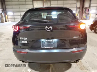 2021 Mazda CX-30 S with VIN 3MVDMBAL2MM207744, listed as a Copart auction lot 55399965 with 49,089 mi miles and Salvage title. Bid and sale history available at DreamBid. Image 6.