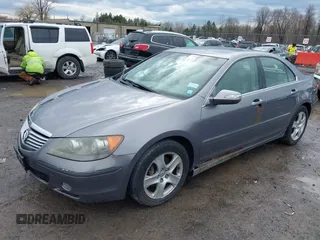 2006 Acura RL z VIN JH4KB165X6C006938, wystawiony jako IAAI lot #41936024 z przebiegiem 235 390 mil mil oraz . Historia ofert i sprzedaży dostępna na DreamBid. Obrazek 2.