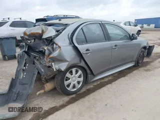 2015 Mitsubishi Lancer ES with VIN JA32U2FU4FU020089, listed as a IAAI auction lot 42036021 with 190,673 mi miles. Bid and sale history available at carsss.com. Image 4.