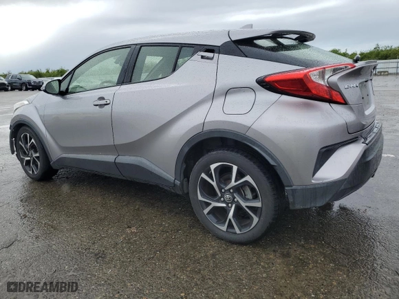 2018 Toyota C-HR XLE with VIN JTNKHMBX6J1008856, listed as a Copart auction lot 49460365 with 77,507 mi miles and Salvage Title. Bid and sale history available at carsss.com. Image 2.