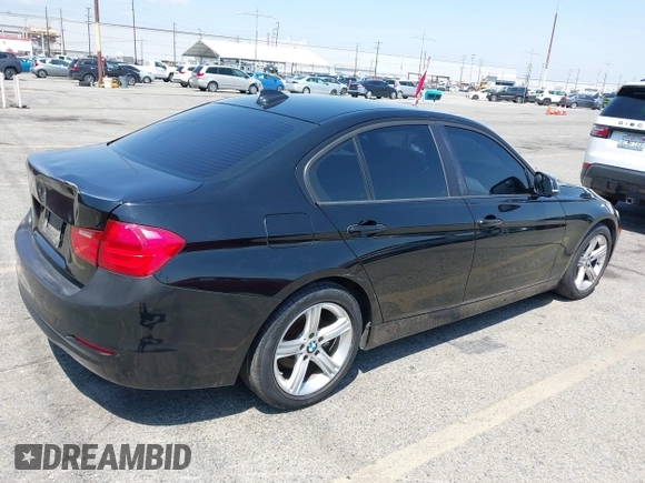 2013 BMW 3 Series 328i with VIN WBA3C1C50DF435120, listed as a IAAI auction lot 42132086 with 137,588 mi miles and . Bid and sale history available at carsss.com. Image 4.