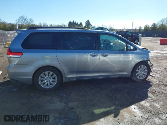 2012 Toyota Sienna XLE with VIN 5TDDK3DC6CS045009, listed as a IAAI auction lot 41790571 with 154,817 mi miles. Bid and sale history available at carsss.com. Image 14.