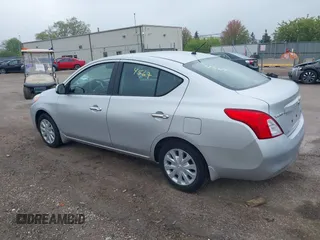 2012 Nissan Versa SV with VIN 3N1CN7AP5CL916413, listed as a IAAI auction lot 42184567 with 71,068 mi miles. Bid and sale history available at carsss.com. Image 3.