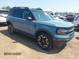 2023 Ford Bronco Sport Outer Banks z VIN 3FMCR9C66PRD01823, wystawiony jako IAAI lot #42817684 z przebiegiem 19 881 mil mil oraz . Historia ofert i sprzedaży dostępna na DreamBid. Obrazek 1.