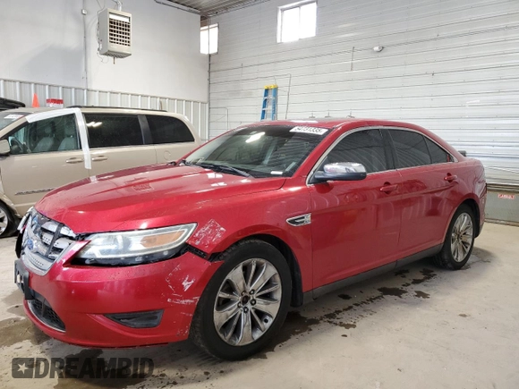 2012 Ford Taurus Limited z VIN 1FAHP2FWXCG104471, wystawiony jako Copart lot #54731335 z przebiegiem 221 397 mil mil oraz Szkoda całkowita • Salvage title. Historia ofert i sprzedaży dostępna na DreamBid. Obrazek 1.