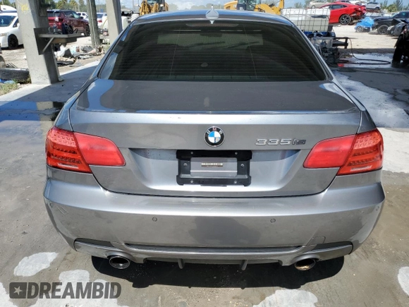 2011 BMW 3 Series 335is with VIN WBAKG1C52BE617713, listed as a Copart auction lot 74064204 with 132,742 mi miles and Salvage Title. Bid and sale history available at carsss.com. Image 6.