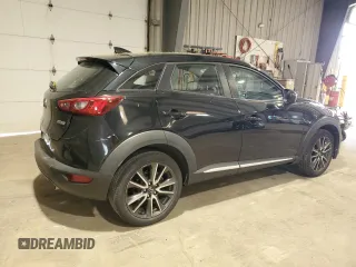 2017 Mazda CX-3 Grand Touring z VIN JM1DKFD71H0141595, wystawiony jako Copart lot #54377305 z przebiegiem 60 907 mil mil oraz Szkody całkowita. Historia ofert i sprzedaży dostępna na DreamBid. Obrazek 3.