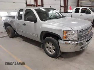 2013 Chevrolet Silverado 1500 LT with VIN 1GCRKSE73DZ328002, listed as a IAAI auction lot 41842745 with 124,496 mi miles and . Bid and sale history available at DreamBid. Image 1.