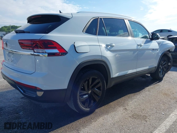 2023 Volkswagen Atlas SE with VIN 1V2WC2CA3PC228213, listed as a IAAI auction lot 42330049 with 21,884 mi miles and . Bid and sale history available at DreamBid. Image 4.