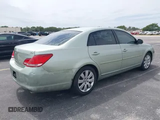 2007 Toyota Avalon XL with VIN 4T1BK36B27U219456, listed as a IAAI auction lot 41747807 with 169,599 mi miles. Bid and sale history available at carsss.com. Image 4.