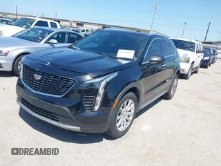 2019 Cadillac XT4 FWD Premium Luxury with VIN 1GYFZCR48KF141478, listed as a IAAI auction lot 41988092 with 53,970 mi miles and . Bid and sale history available at carsss.com. Image 2.