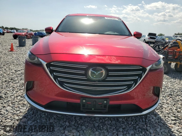 2023 Mazda CX-9 Grand Touring z VIN JM3TCBDY4P0633408, wystawiony jako Copart lot #57242685 z przebiegiem 28 859 mil mil oraz Szkoda całkowita • Salvage title. Historia ofert i sprzedaży dostępna na DreamBid. Obrazek 5.