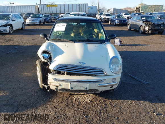 2004 MINI Hardtop with VIN WMWRC33464TJ58388, listed as a IAAI auction lot 40827409 with 102,322 mi miles and . Bid and sale history available at DreamBid. Image 12.