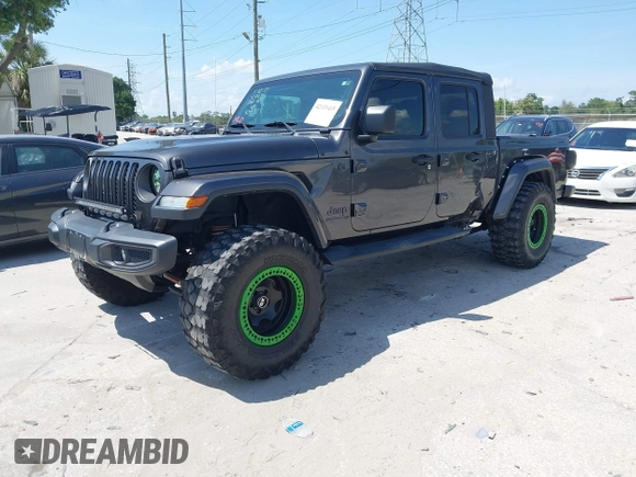 2021 Jeep Gladiator Freedom с VIN 1C6HJTAG2ML512027, выставлен на аукционе IAAI как лот 42333415 с пробегом 60 849 миль миль и . История ставок и продаж доступна на DreamBid. Изображение 2.