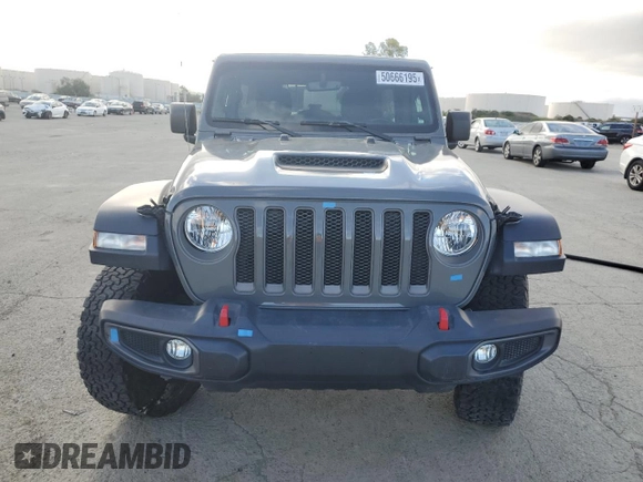 2020 Jeep Wrangler Unlimited Rubicon with VIN 1C4HJXFN9LW156972, listed as a Copart auction lot 50666195 with 13,834 mi miles and Salvage title. Bid and sale history available at DreamBid. Image 5.