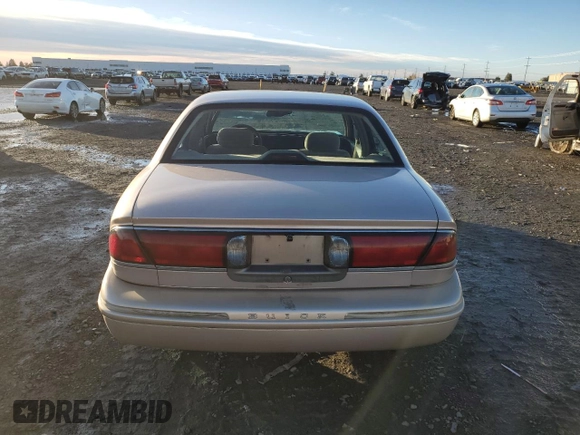 1999 Buick LeSabre Limited with VIN 1G4HR52KXXH452758, listed as a Copart auction lot 85077744 with 211,060 mi miles and Salvage Title. Bid and sale history available at DreamBid. Image 6.