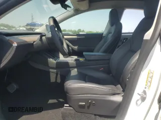 2024 Tesla Model Y с VIN 7SAYGDED3RF182859, выставлен на аукционе Copart как лот 61368825 с пробегом 13 914 миль миль и Списание • Salvage title. История ставок и продаж доступна на DreamBid. Изображение 7.