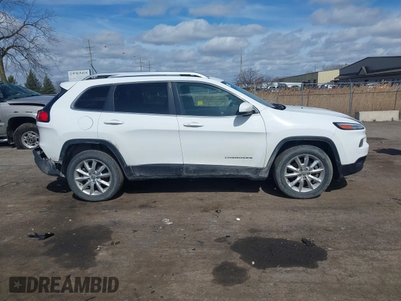 2015 Jeep Cherokee Limited with VIN 1C4PJMDS7FW522581, listed as a IAAI auction lot 41870516 with 143,904 mi miles and . Bid and sale history available at DreamBid. Image 13.